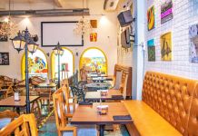 With Great Food & Paintings on Display From Over 80 + Artists, Here’s Why This Cafe in CP is a Must Visit!